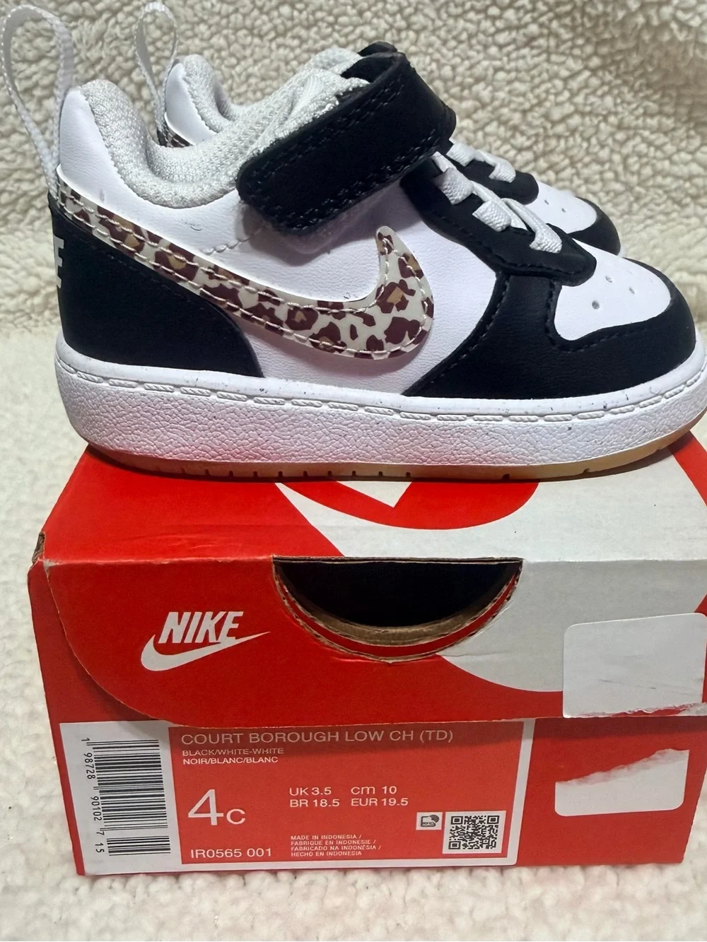 Nike Kids Black and White Sneakers with Leopard-Print Swoosh
